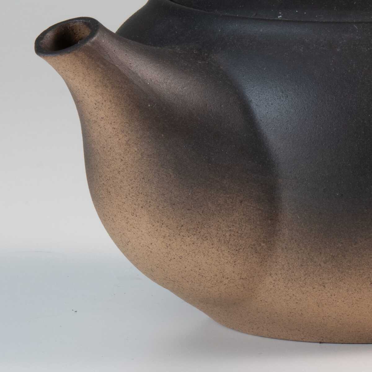 close up on the ceramic japanese tea pot