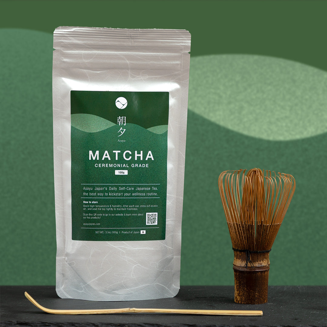 Matcha tea package with a whisk and spoon on a green background