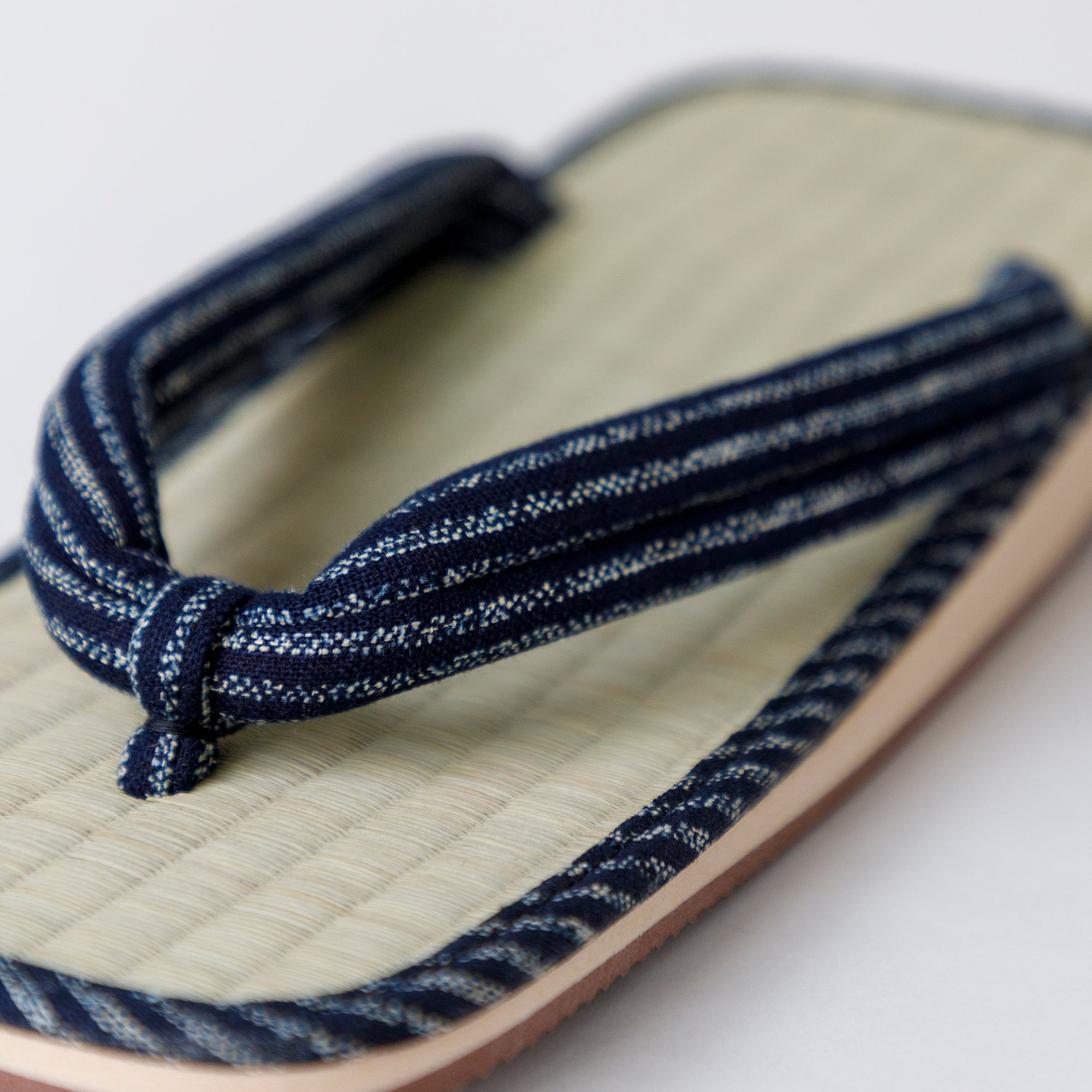 close view of the sandal stripes blue lace