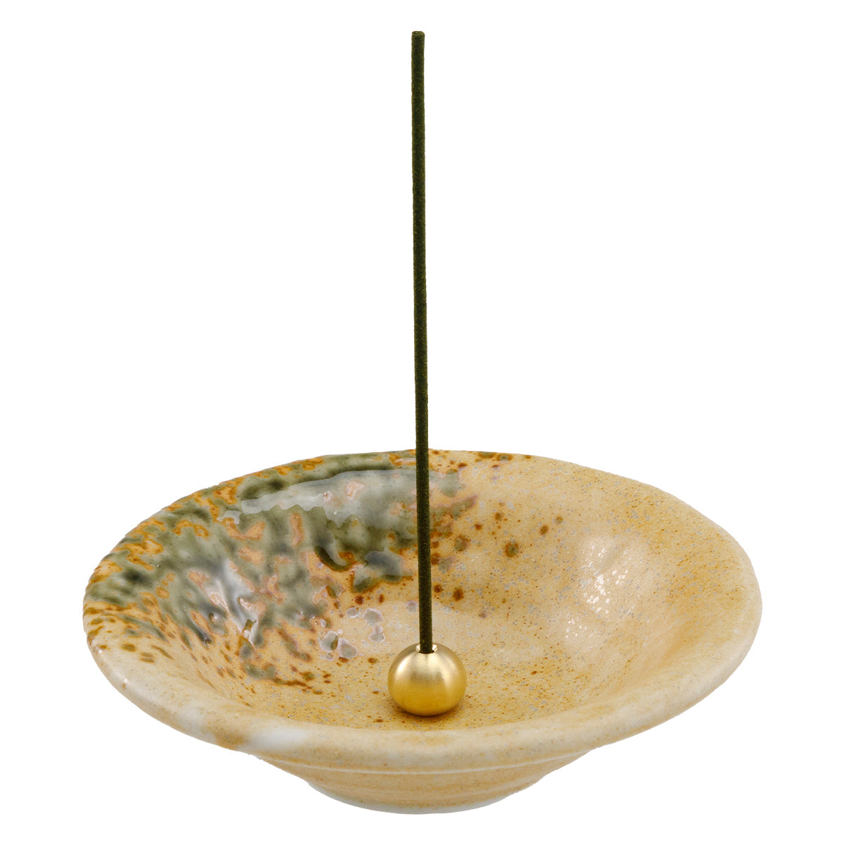 incense stick in orange ceramic holder