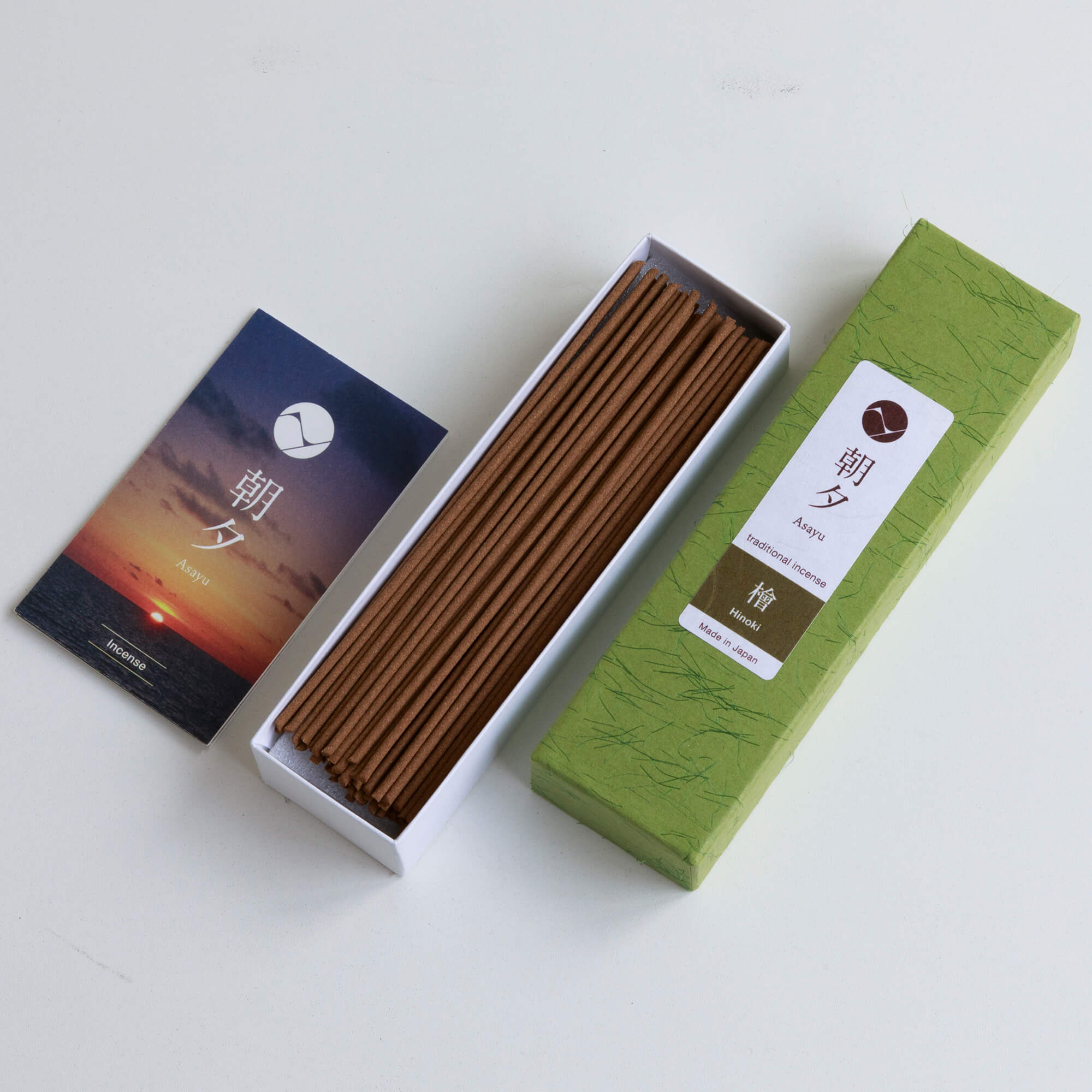 box of hinoki incense sticks next to asayu catalog