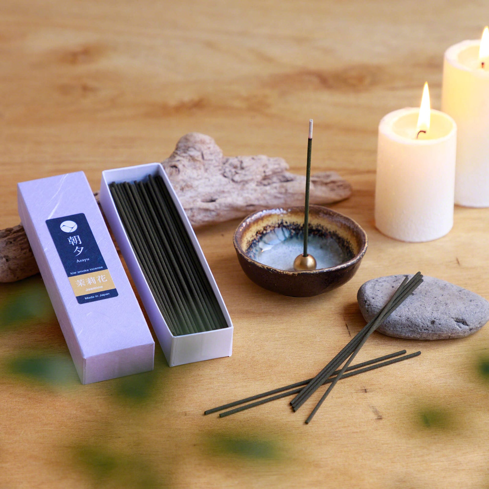 20g Box of jasmine incense sticks in displaywit incense holder and candles