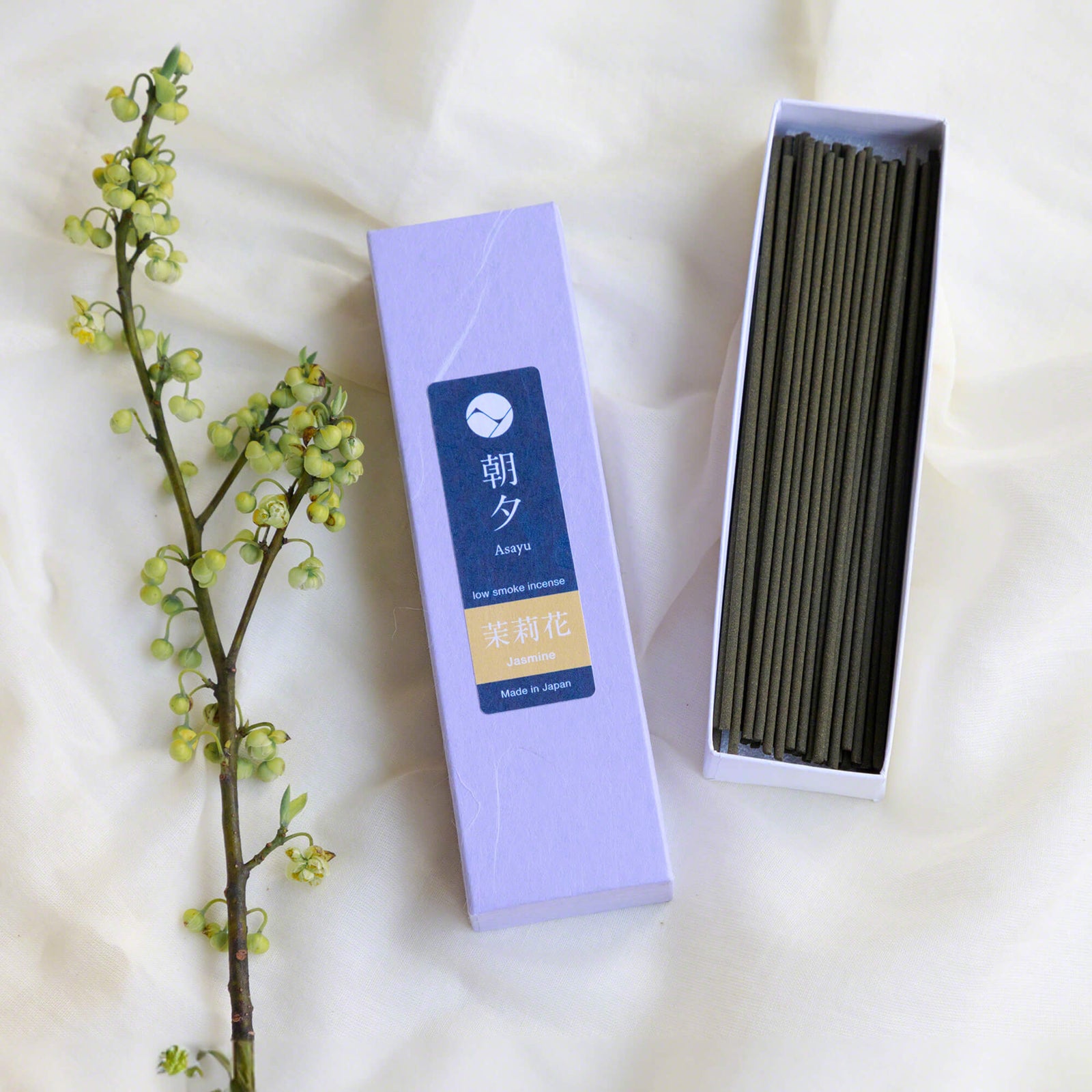 20g Box of jasmine incense sticks in display with a plant stem