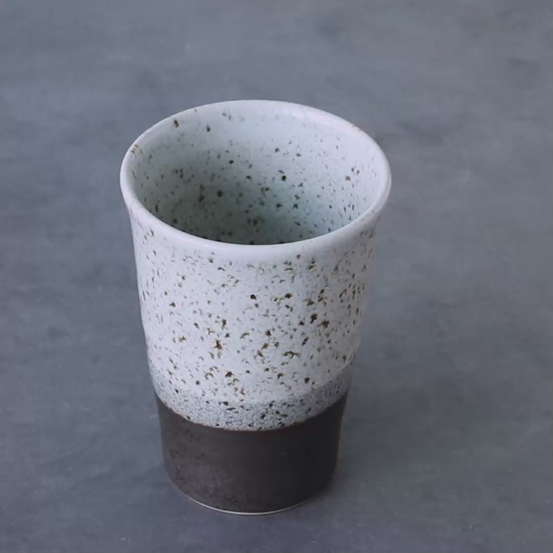 Gray Ceramic Tea Cup on  a gray background