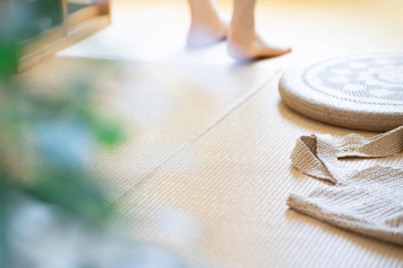 A girl walking barefoot in a tatami room, Japanese style room in summer in Japan,