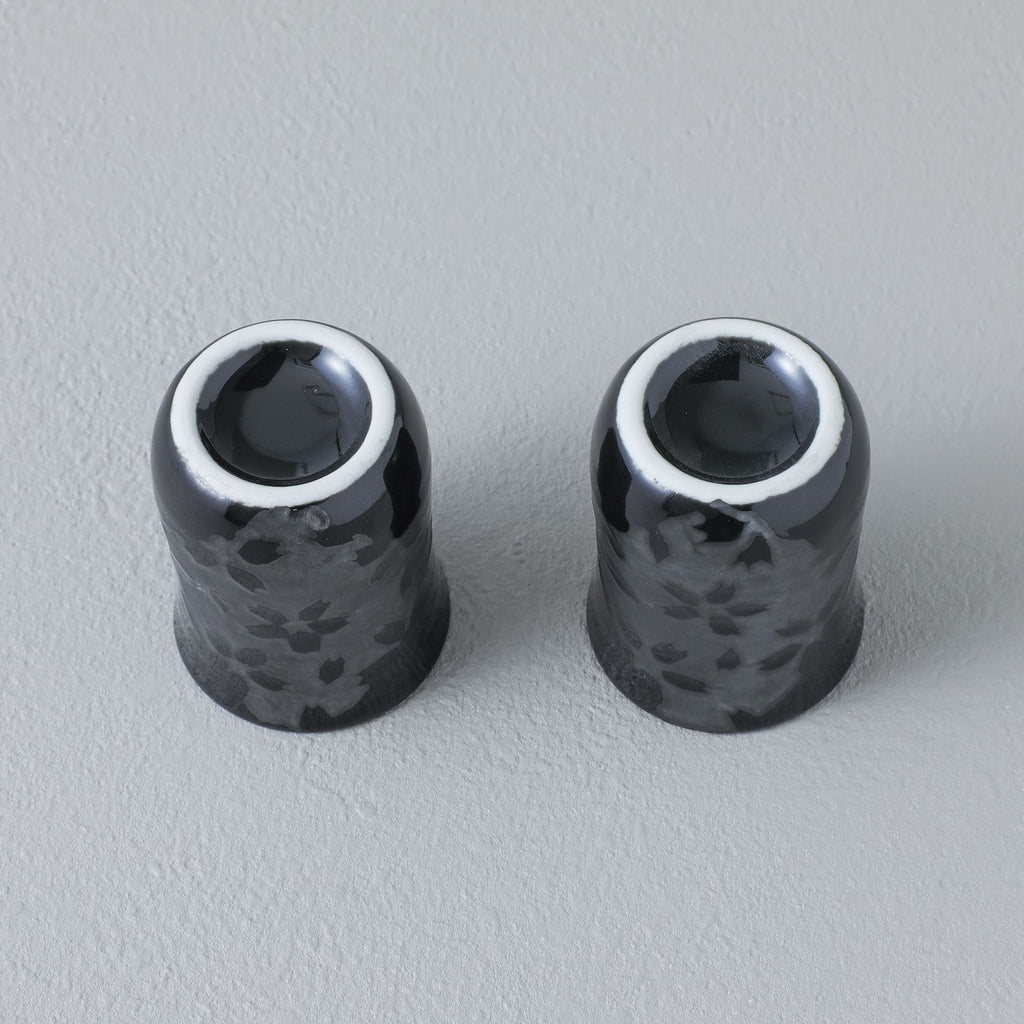 bottom view of two sake cups