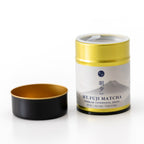 Mt. Fuji Matcha container with black lid on a white background
