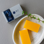 Persimmon soap on a gray background
