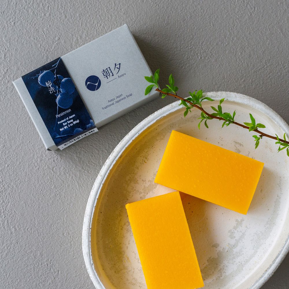 Persimmon soap on a gray background