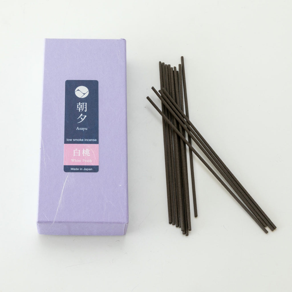 Peach incense sticks box 40g next to soem incense sticks