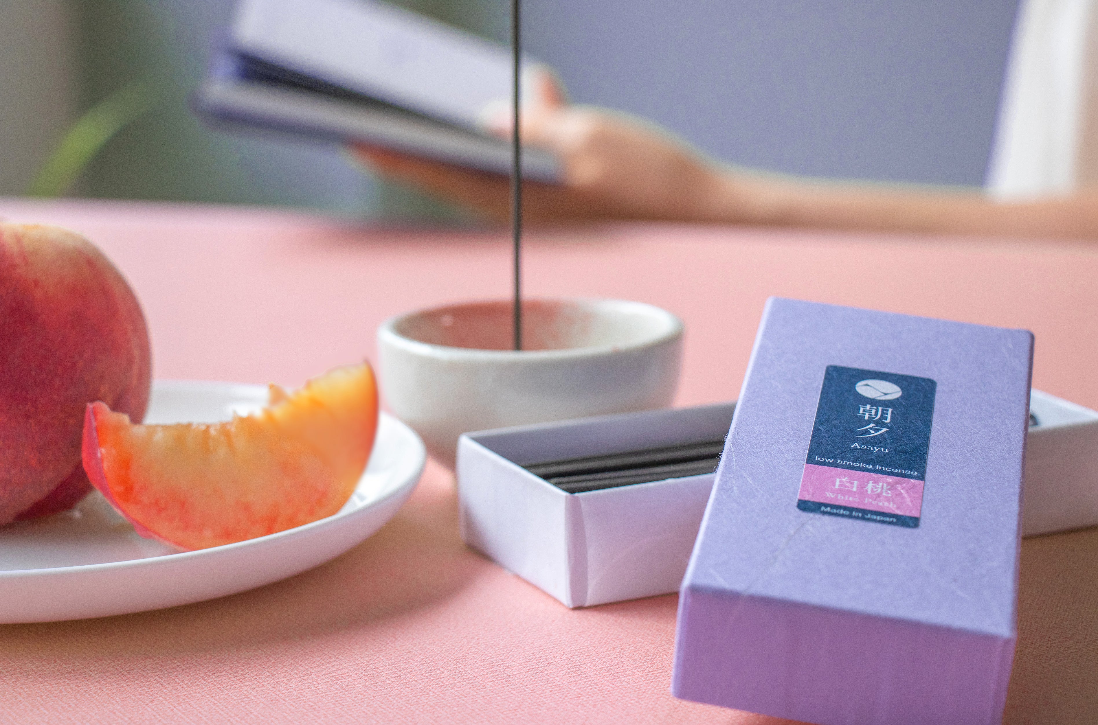 Peach incense sticks box 40g with incense holder and a sliced peach