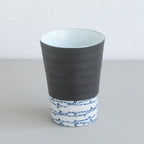 grey and white tea cup