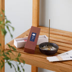 Floral incense sticks variety pack with incense holder on wood shelf