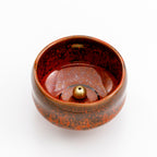 orange incense holder