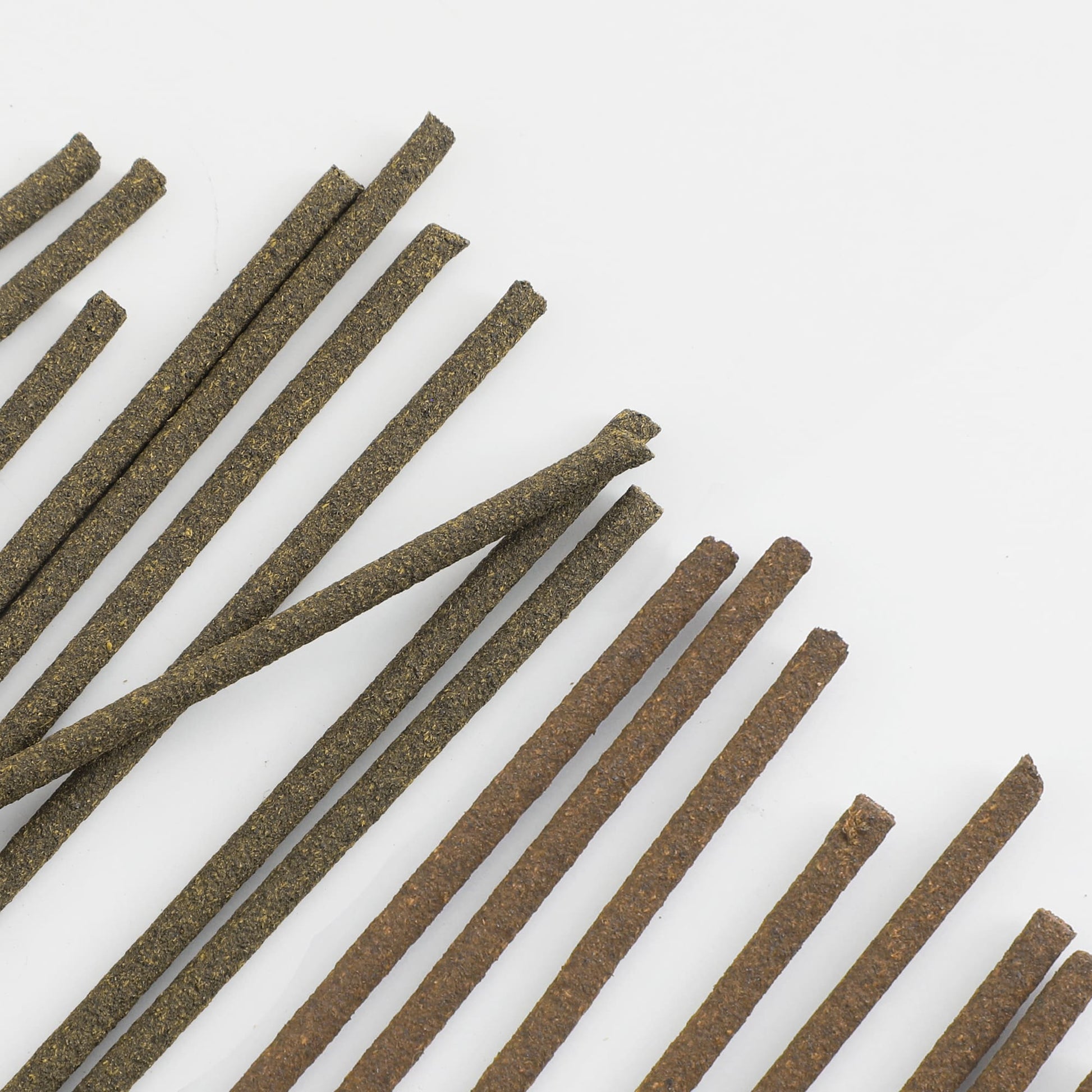 close up on juniper incense sticks