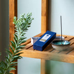 20g Box of sandalwood incense  sticks in display wiwht incense holder ona shelf