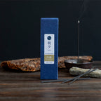 20g Box of sandalwood incense sticks in display with wood bark and incense holder