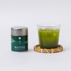 Asayu Matcha Ceremonial with a glass of matcha