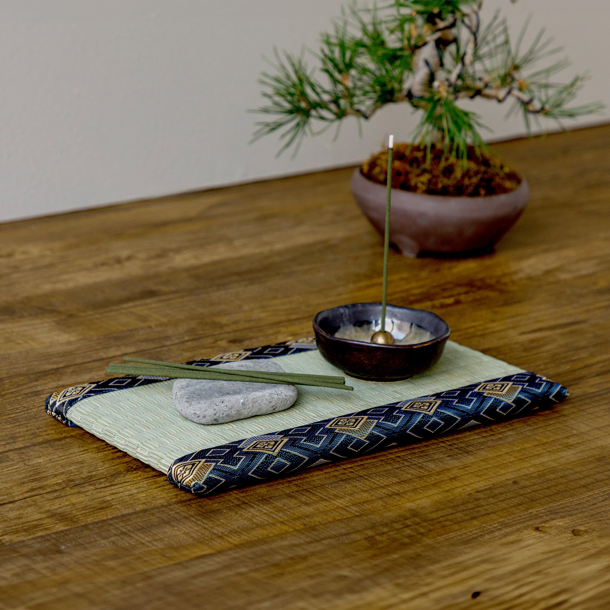 Blue tatami with incense holder incense sticks