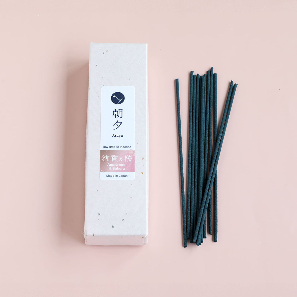 premium sakura incense sticks and box pink background