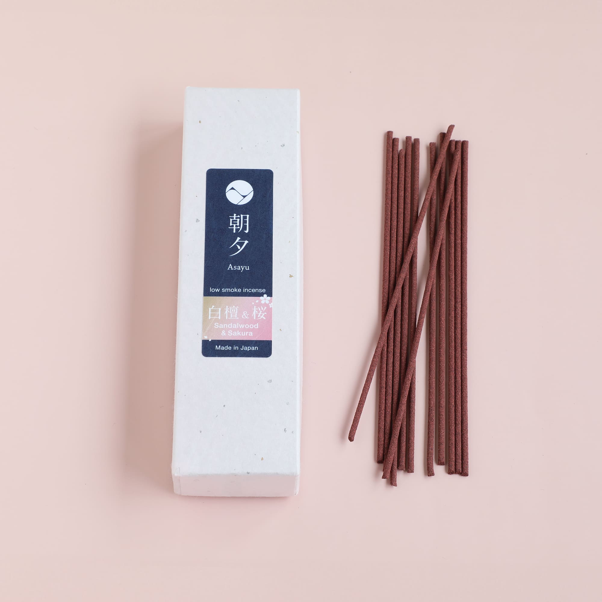Sakura Sandalwood Incense on pink background