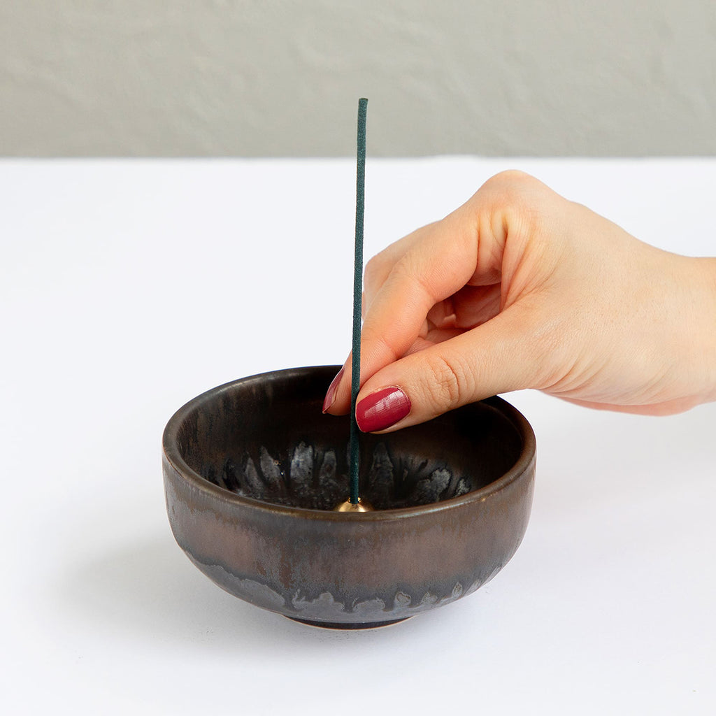 zen ceramic incense holder with white background