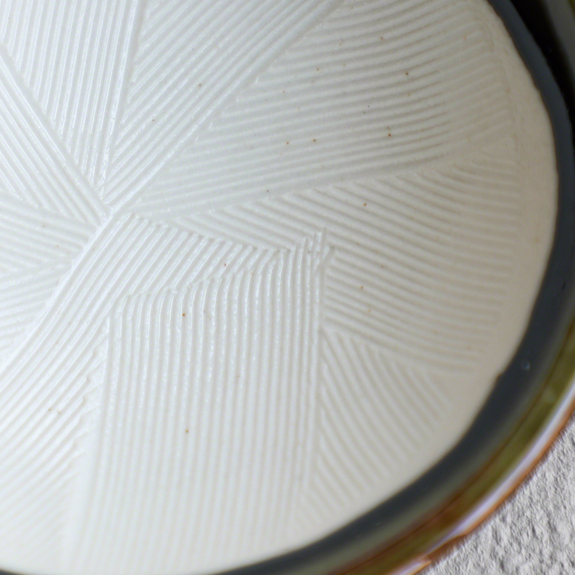 Close-up of the inside of the Asayu Japan Ceramic Olive Green Mortar Bowl