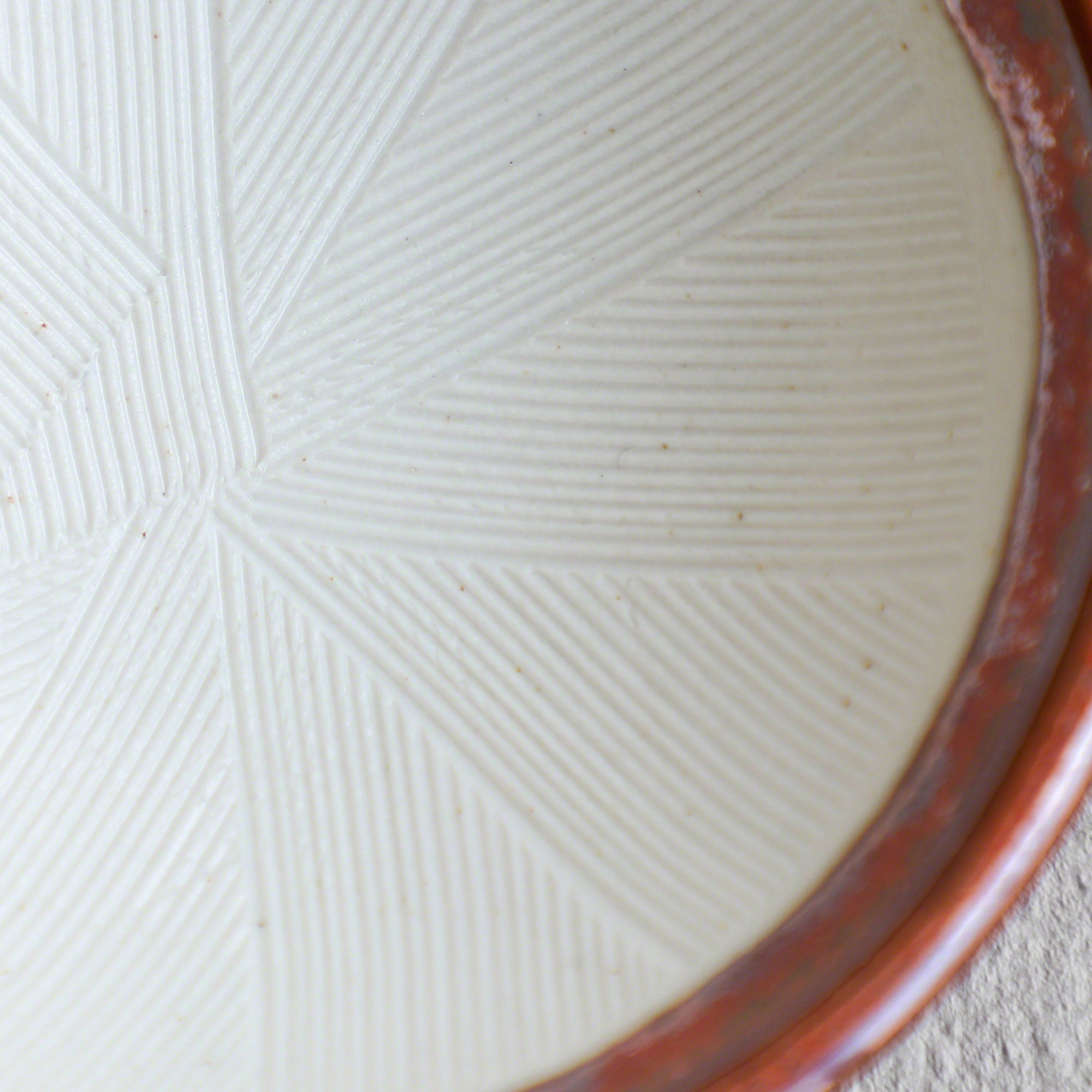 Close-up of the inside of the Asayu Japan Ceramic Red Mortar Bowl