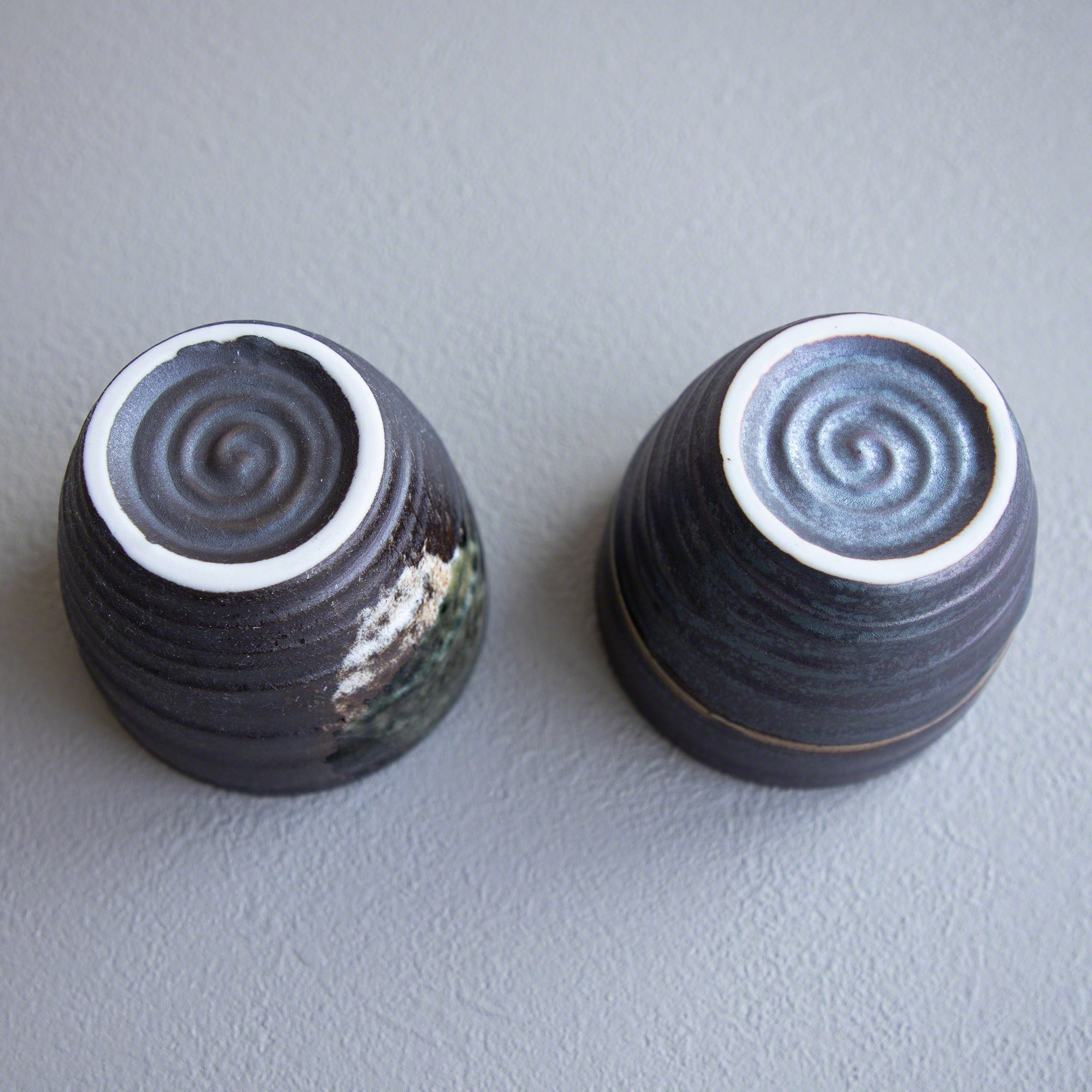Bottom of the Handpainted Glazed Ceramic Tea Cups Set of 2 in Blue and White by Asayu Japan.