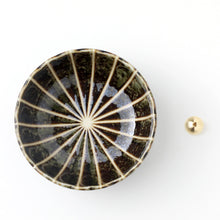 Load image into Gallery viewer, Asayu Japan dark green lotus flower ceramic incense plate with included brass incense burner stand next to it from the top.
