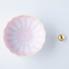 Asayu Japan Cherry Blossom Pink ceramic incense plate with included brass incense burner stand next to it from the top.