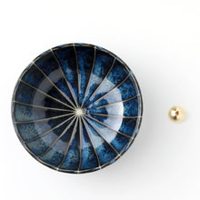 Load image into Gallery viewer, Asayu Japan dark navy blue lotus flower ceramic incense plate with included brass incense burner stand next to it from the top.
