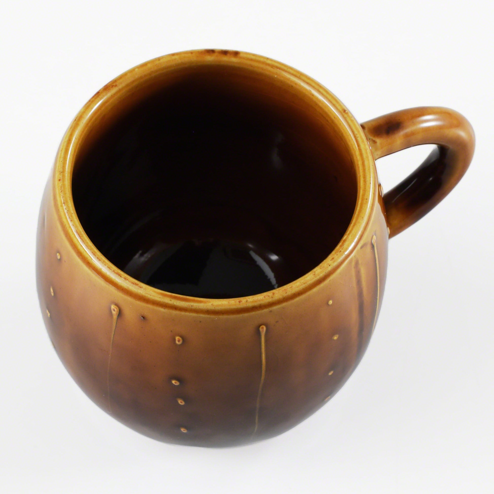 View from the top of the Asayu Japan Ceramic Coffee Mug in caramel.