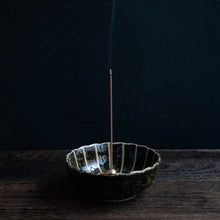 Lade das Bild in den Galerie-Viewer, Cedar Wood incense sticks burning in an incense holder
