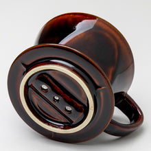 Lade das Bild in den Galerie-Viewer, Bottom of the Asayu Japan Ceramic Coffee Dripper in chocolate brown with the 3 filter holes.
