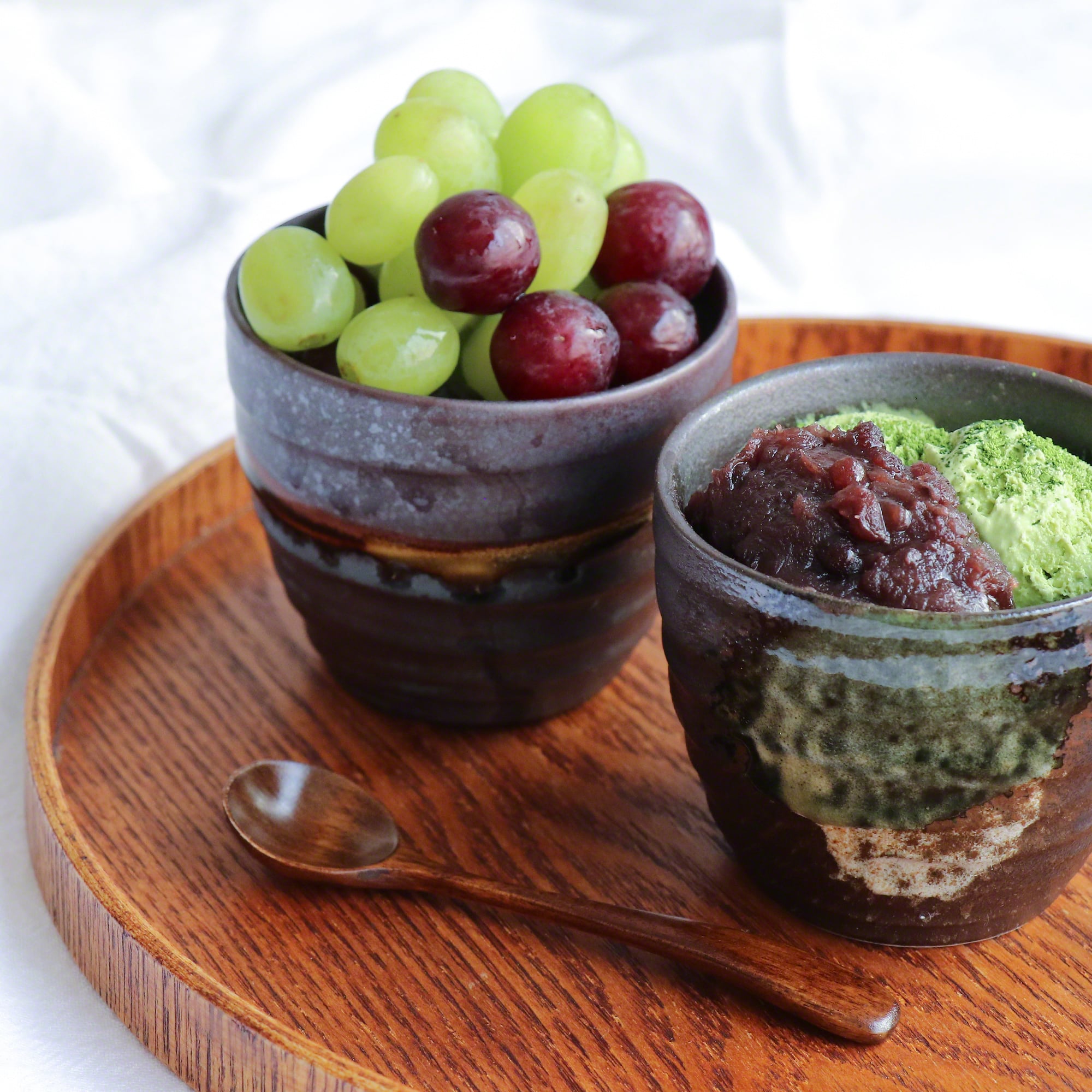 Handpainted Glazed Ceramic Tea Cups Set of 2 in Blue and White by Asayu Japan as fruit and ice cream serving bowls.