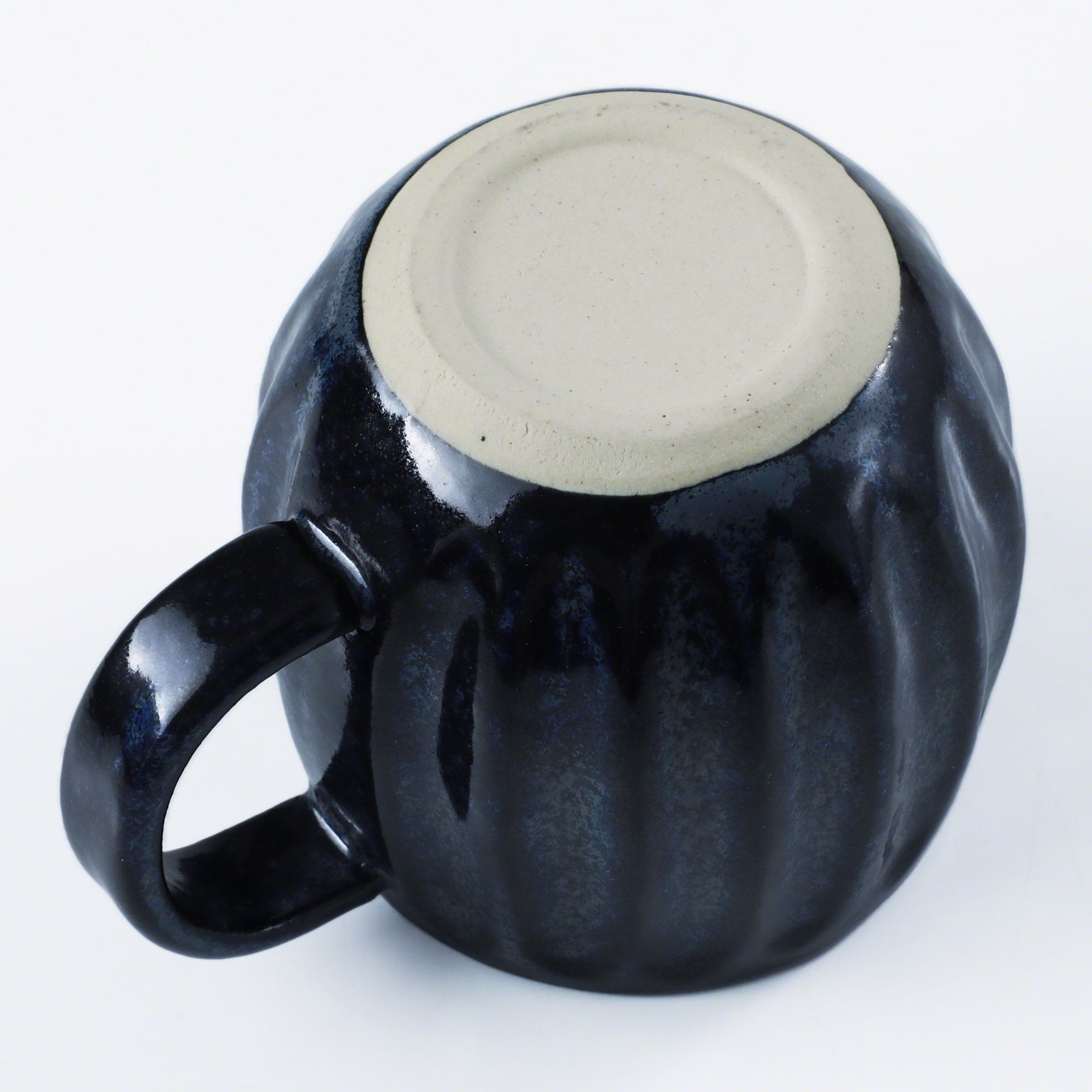 Bottom of the Asayu Japan Ceramic Coffee Mug in dark navy blue.