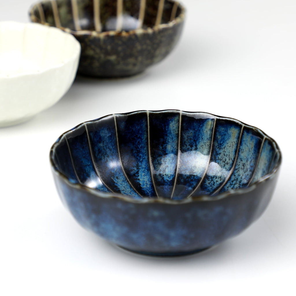 Dark Navy Blue Lotus incense holder by Asayu Japan in front of the rest of the Lotus Flower shaped incense holder collection