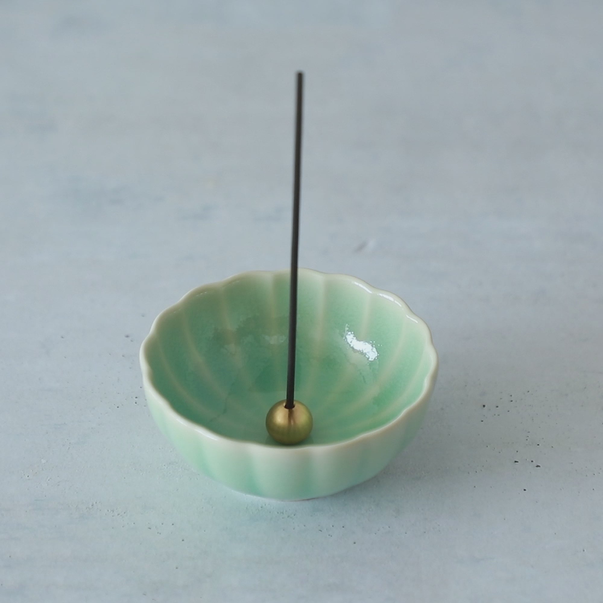 Video showing all sides of the Asayu Japan Pale Turquoise Mini Lotus Flower Ceramic Incense Holder
