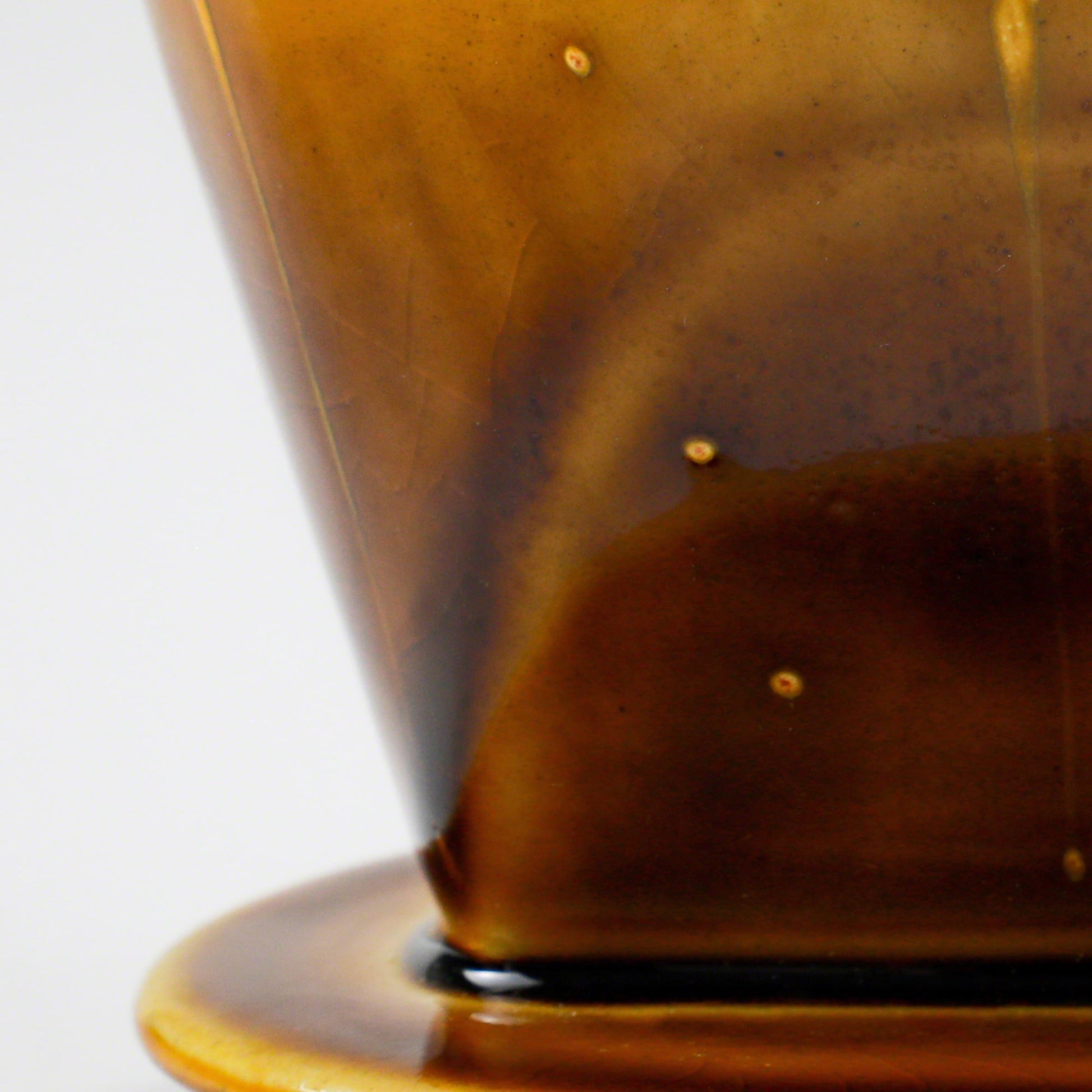 Close-up of the glaze in the Asayu Japan Ceramic Coffee Dripper in Caramel..