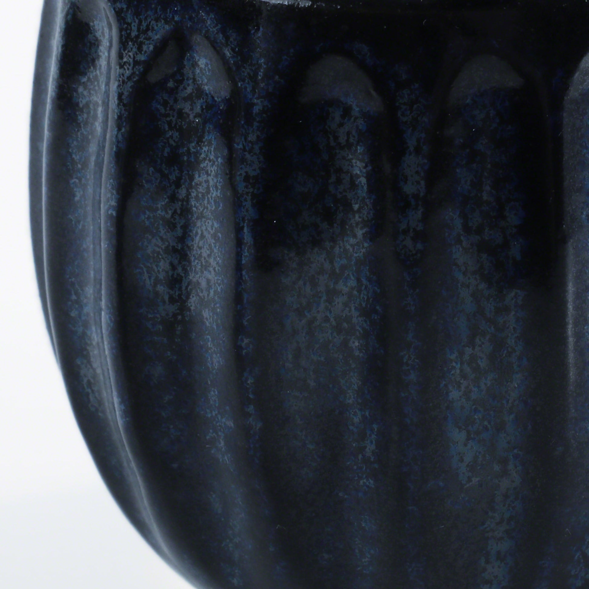 Close-up of the glaze in the Asayu Japan Ceramic Coffee Mug in dark navy blue.
