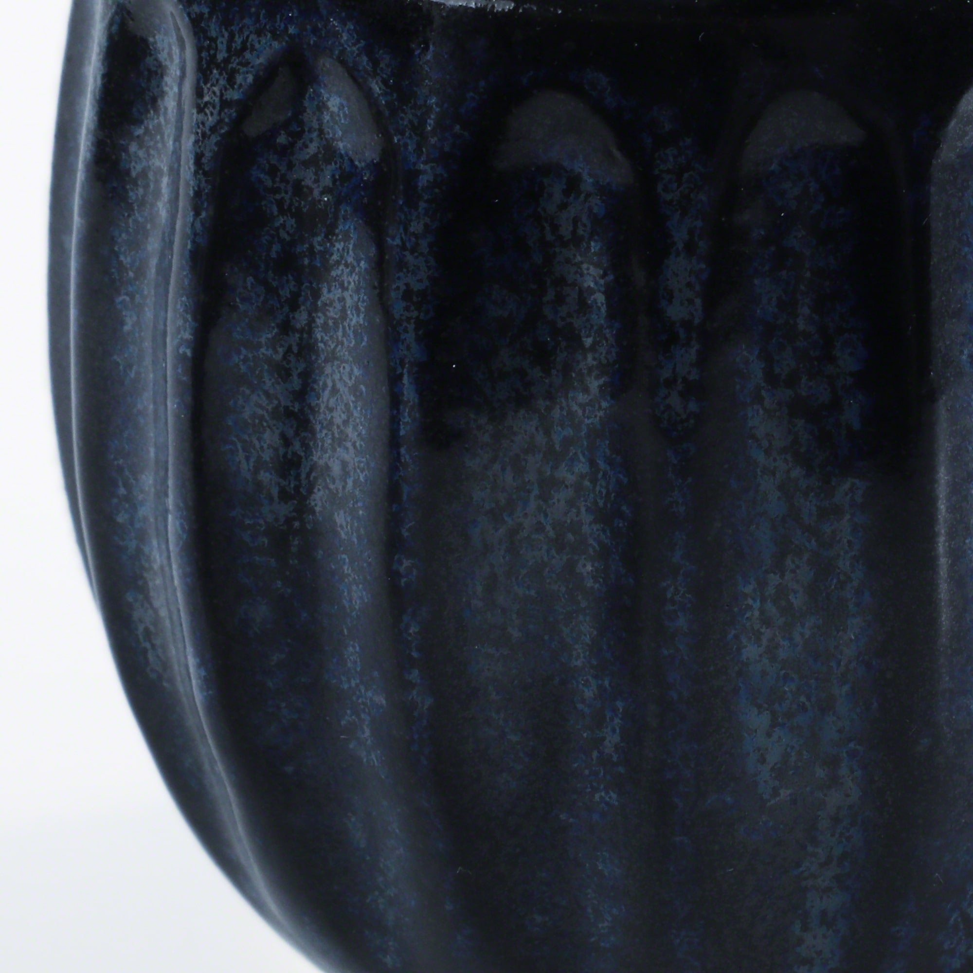 Close-up of the glaze in the Asayu Japan Ceramic Coffee Mug in dark navy blue.
