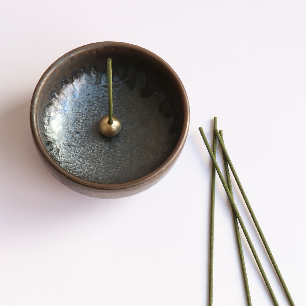 Asayu Japan Zen Incense Holder with brass stand next to incense sticks