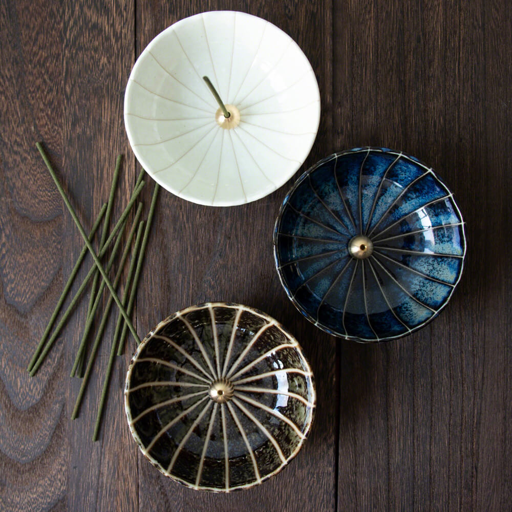 Three of Asayu Japan Lotus Flower Incense Holders: white, dark blue and dark green models.