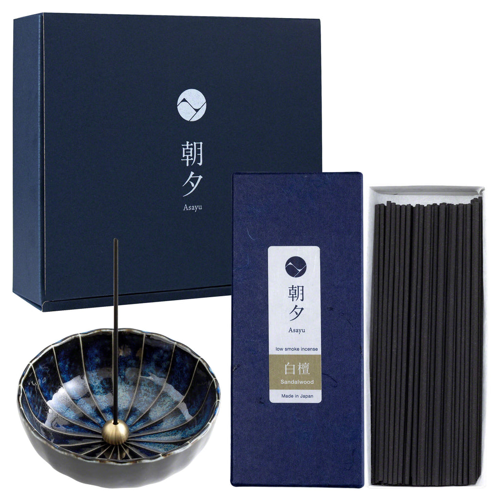 sandalwood incense box with navy lotus holder in front of blue gift box