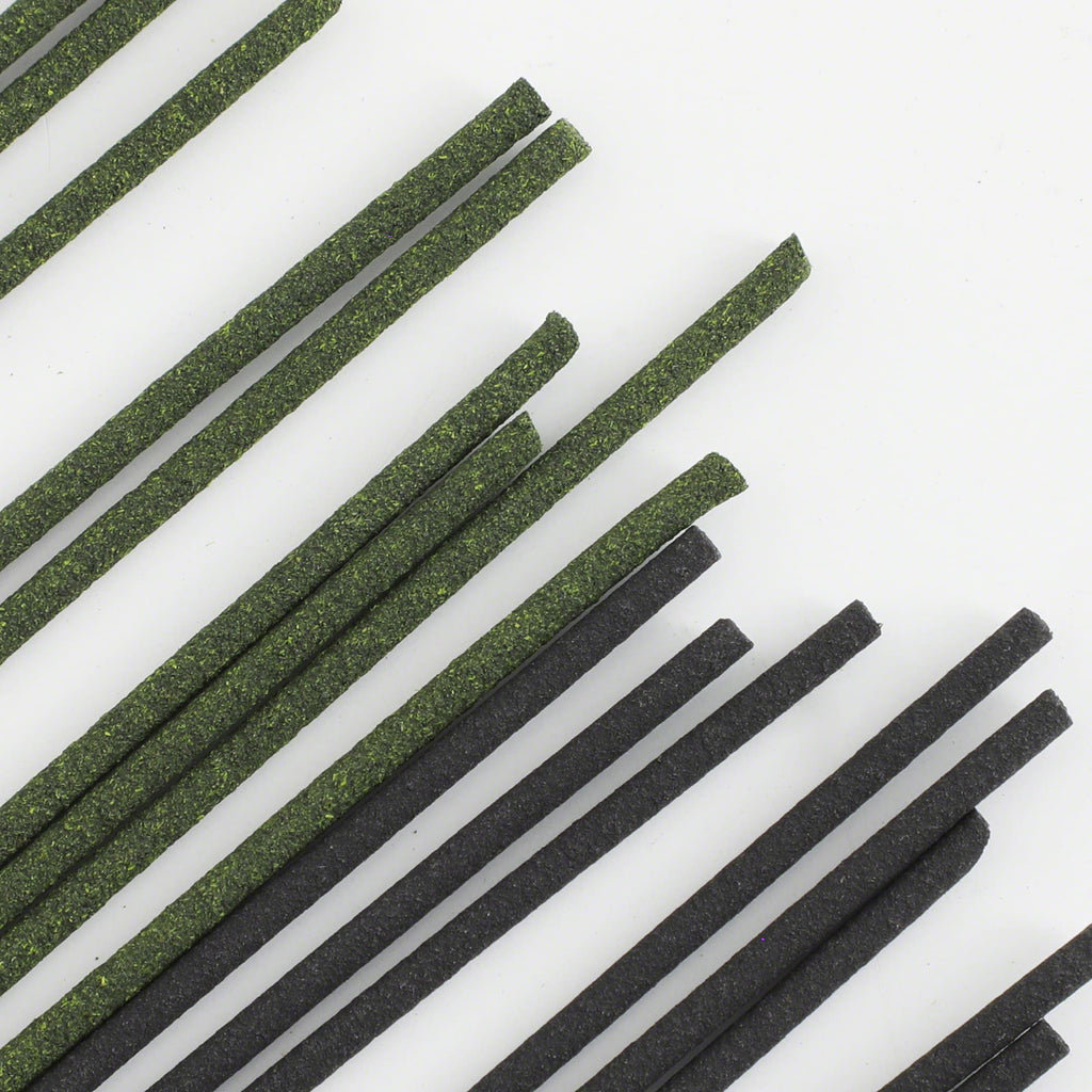 close up on sandalwood abd lotus incense sticks