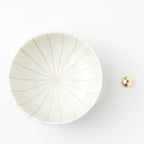 Asayu Japan white lotus flower ceramic incense plate with included brass incense burner stand next to it from the top.